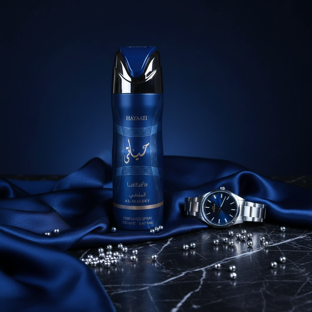 Hayaati Al Maleky - Lifestyle dark marble with silver watch and blue silk